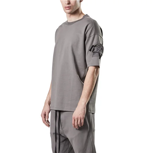 THOM KROM T-SHIRT OVERSIZE CON TASCHINO